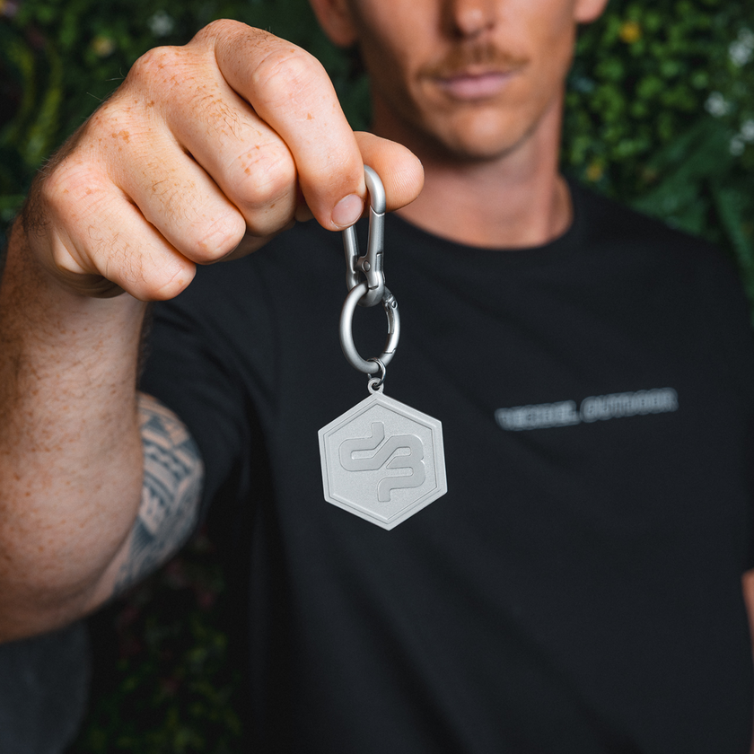 91. Keychain Logo Metal silver